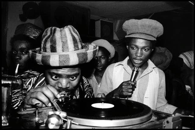 Pioneering sound-system operator Clement ‘Coxsone’ Dodd with the microphone 